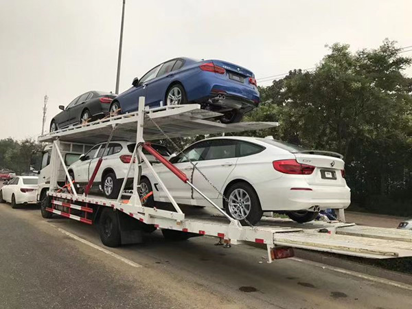 從廣州托運汽車到哈爾濱大概幾天到？要多少錢